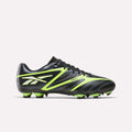 The Reebok Sidewinder 26 League Firm Ground Soccer Cleats in black with neon yellow and green accents feature the Reebok logo on the side and firm ground studs, shown against a plain white background.