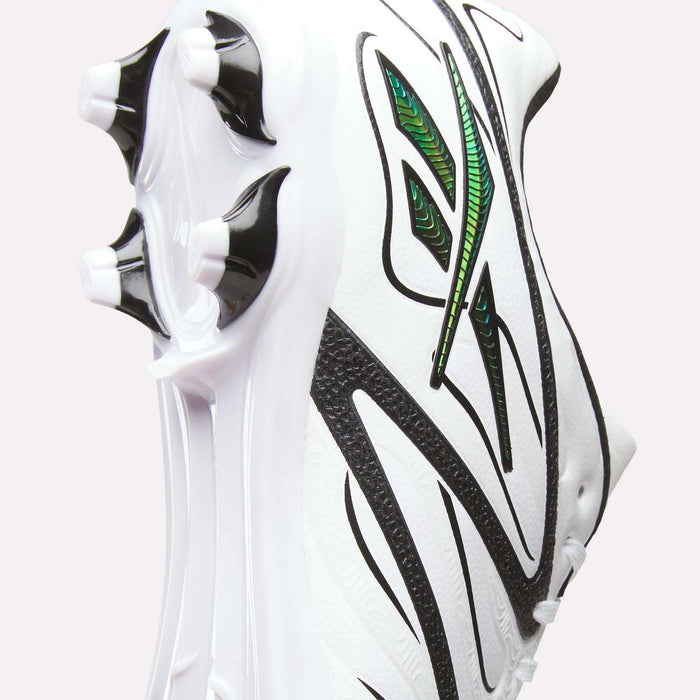 Close-up of the Reebok Sidewinder 26 League Firm Ground Cleats in white, featuring black lines and green accents, with a focus on the firm ground studs designed for enhanced ball control, set against a plain light background.