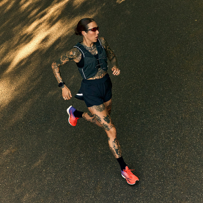 Woman running on concrete in SpeedShifter shoes