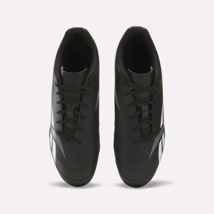 Top view of the Reebok Strike Multi Ground Soccer Cleats in black, featuring white side accents, black laces, and a dark inner lining, showcased on a plain white background—ideal soccer shoes for turf surfaces.