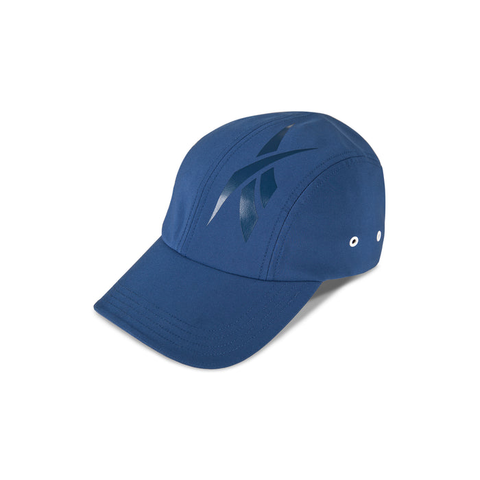 The Reebok Technical Running Cap With Drawcord features a dark blue abstract front, two white side eyelets, and is made from recycled materials. Shown on a white background.