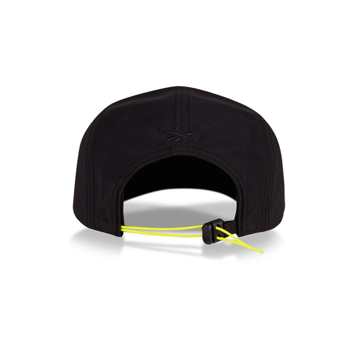 Back view of the Reebok Technical Running Cap With Drawcord in black, featuring an adjustable neon yellow drawstring with black toggle, made from recycled materials, shown on a white background.