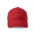 A red Reebok Vector Baseball Cap with a curved brim, tone-on-tone embroidered front logo, and adjustable snapback closure is shown on a white background.