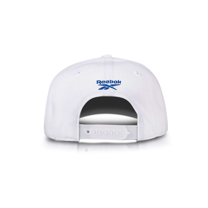 The image shows the back view of a white Reebok Vector Baseball Cap featuring an adjustable snapback closure and a blue embroidered Reebok logo above the opening.