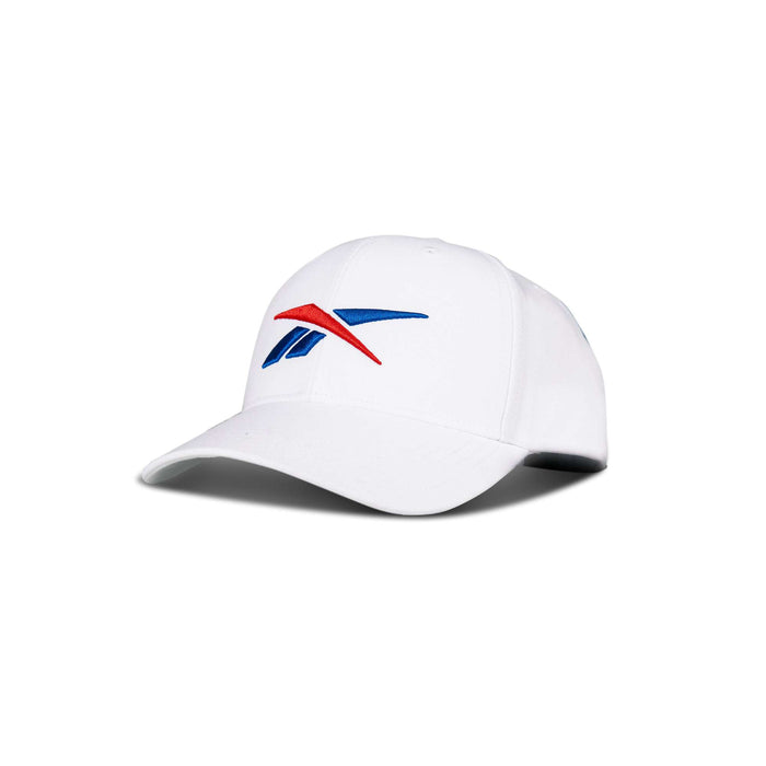 The Reebok Vector Baseball Cap is a white hat with the blue and red Reebok logo on the front, shown against a plain white background.