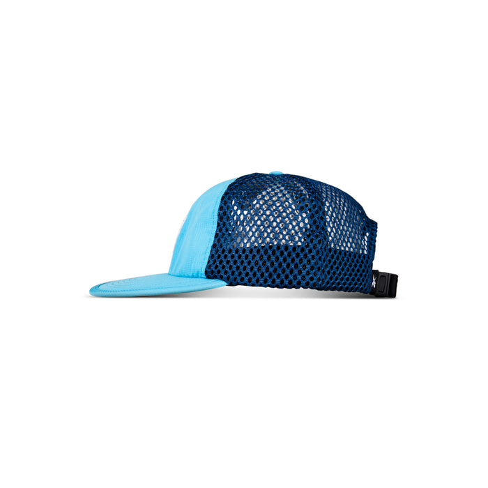 The Reebok Vented Flat Brim Running Cap is a blue mesh trucker hat with a solid light blue brim and front panel, dark blue vented sides and back for breathability, and an adjustable black strap, shown in side profile on a white background.
