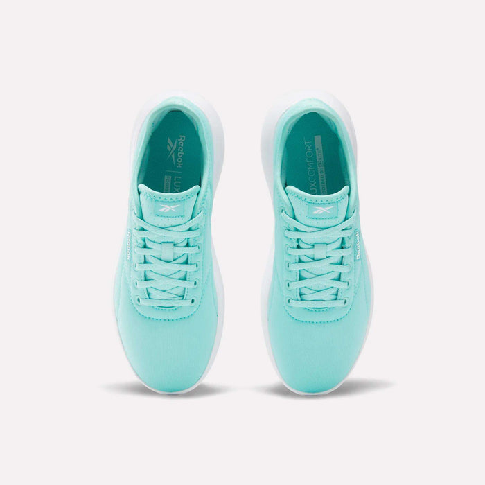 A top-down view of Reebok Women's Active Lite Shoes in turquoise showcases white soles and matching laces against a light background—minimalist and stylish sneakers with modern appeal.