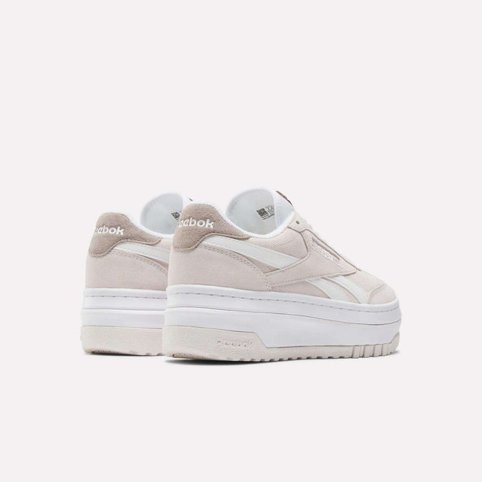 A pair of Women's Campio Extra Shoes by Reebok in beige and white suede with thick white soles, shown from the back and side against a plain light background.