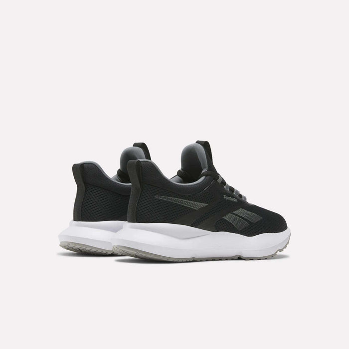 A pair of Reebok Women's Cityride 2 Running Shoes in black with white soles are angled to display the back and side views against a light background. They feature mesh uppers, subtle branding, and FuelFoam cushioning for comfort.