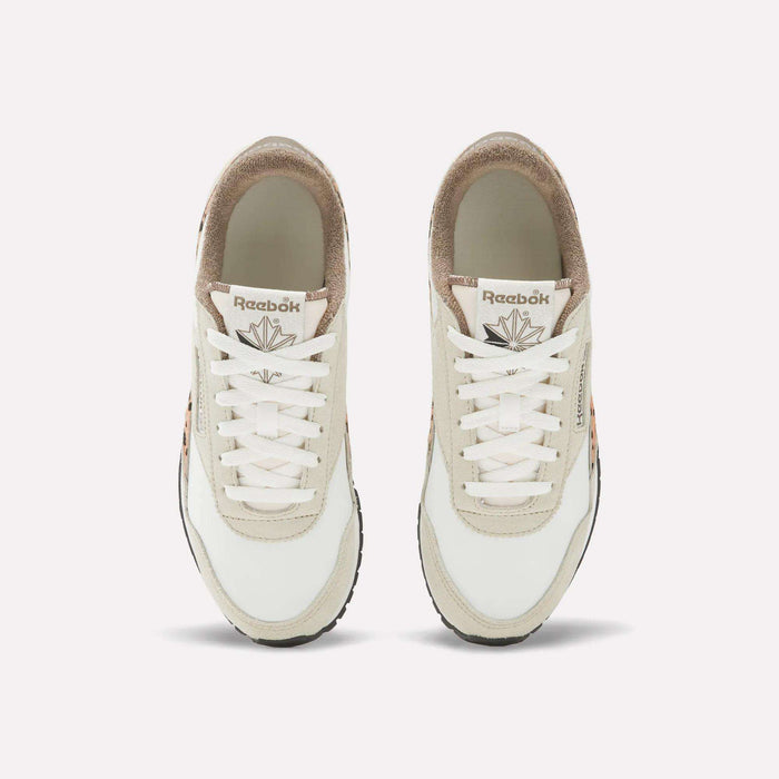 Top view of Reebok Women's Classic AZ Shoes with white laces, beige suede and white leather uppers, tan accents, and visible Reebok logos on the tongues, set against a plain white background for a retro vibe.