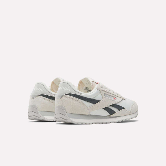 A pair of Reebok Women's Classic AZ Shoes, featuring black and beige accents, shown from the side and back on a plain white background.