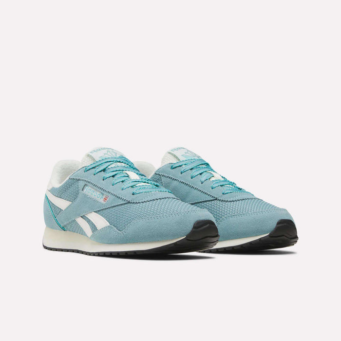 A pair of Women’s Classic AZ Shoes by Reebok, featuring a light blue retro running design with white accents and teal details, displayed side by side on a plain white background.
