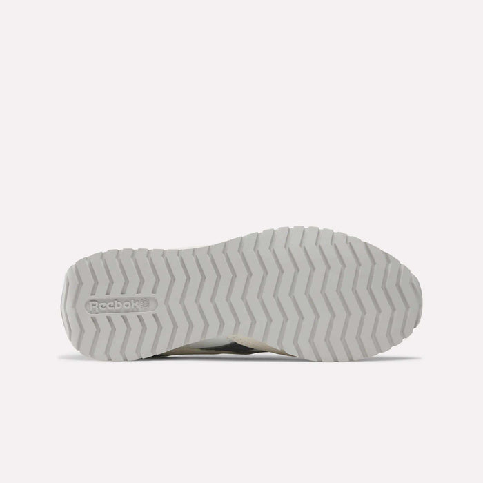 Bottom view of Women's Classic AZ Shoes by Reebok, featuring a white sole with zigzag tread and Reebok logo on the heel, shown against a light background—perfect vintage-inspired running shoes for women.