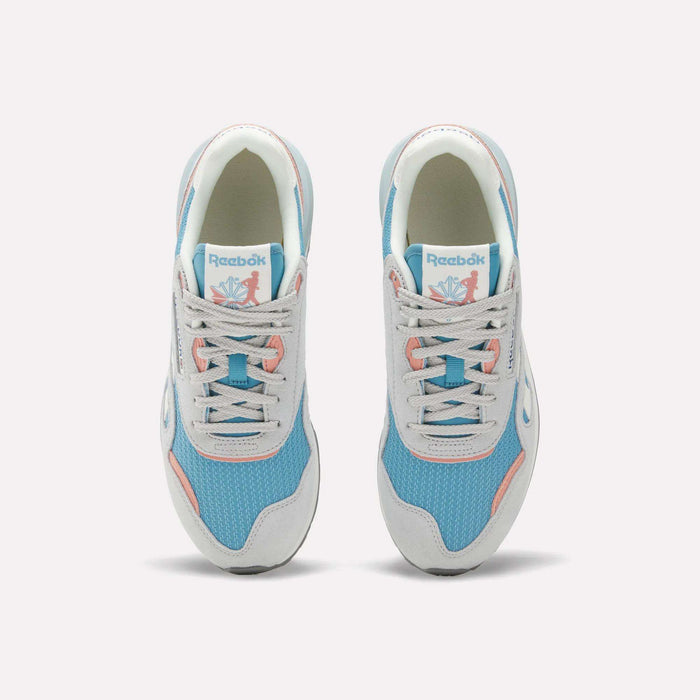 The Reebok Women's Classic Nylon 89 Shoes, seen from above, feature light blue mesh, white overlays, light gray laces, pink accents, retro style details, and the Reebok logo on the tongue.
