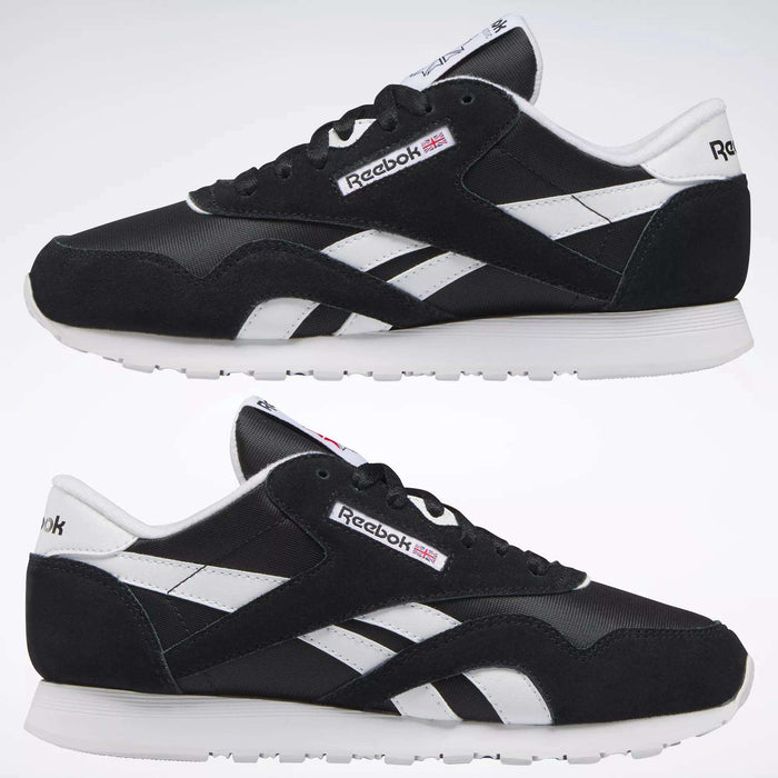 Reebok Women's Classic Nylon Shoes in black feature white soles, side stripes, and logo details on the tongue and heel—versatile sneakers shown from the side against a plain background, ideal for everyday casual outfits.
