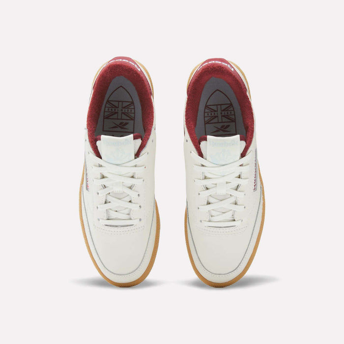 The Women's Club C Golf Shoes by Reebok are white, water-resistant leather golf shoes with a sleek spikeless outsole for comfort on and off the course.