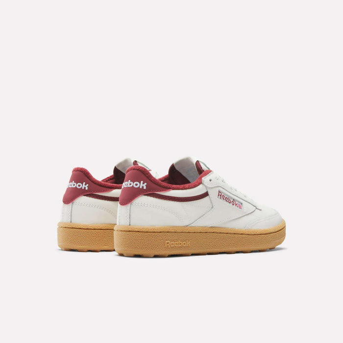 Reebok Women's Club C Golf Shoes feature white and red water-resistant leather uppers and a spikeless outsole.