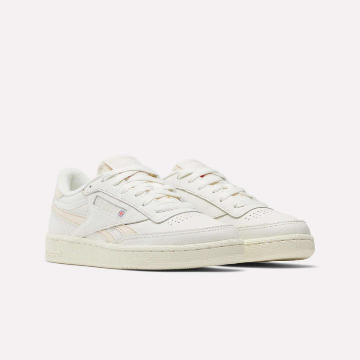 The Women's Club C Revenge Vintage Shoes by Reebok are classic white sneakers inspired by vintage style—perfect for anyone who appreciates timeless fashion.