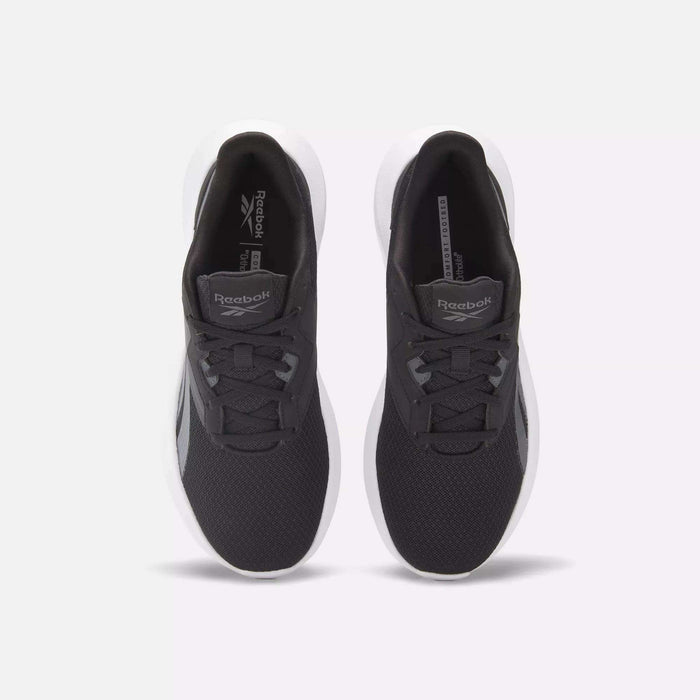 Top view of Women's Energen Lux Running Shoes by Reebok, featuring mesh uppers, laces, and white soles for breathability and comfort, displayed side by side on a light gray background.