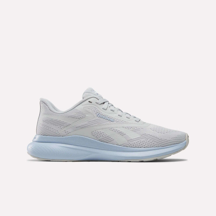Women's Reebok Energen Run 4 running shoes in Grey 1/Y2K Blue, featuring a breathable mesh upper, lace-up closure, and cushioned sole, shown in profile against a white background.