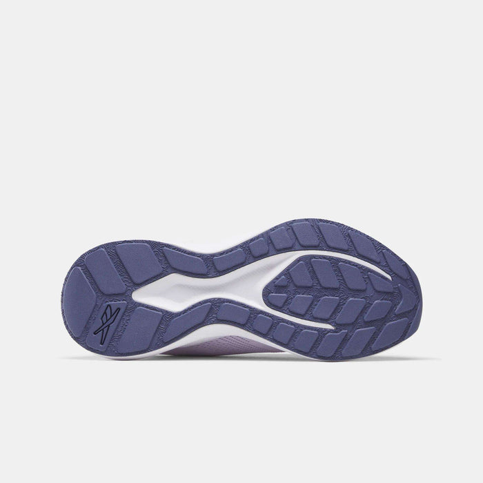 The bottom view of the Reebok Women's Energen Run 4 Running Shoes shows a purple and white sole with textured tread, FuelFoam midsole for comfort, and Reebok branding on the heel.
