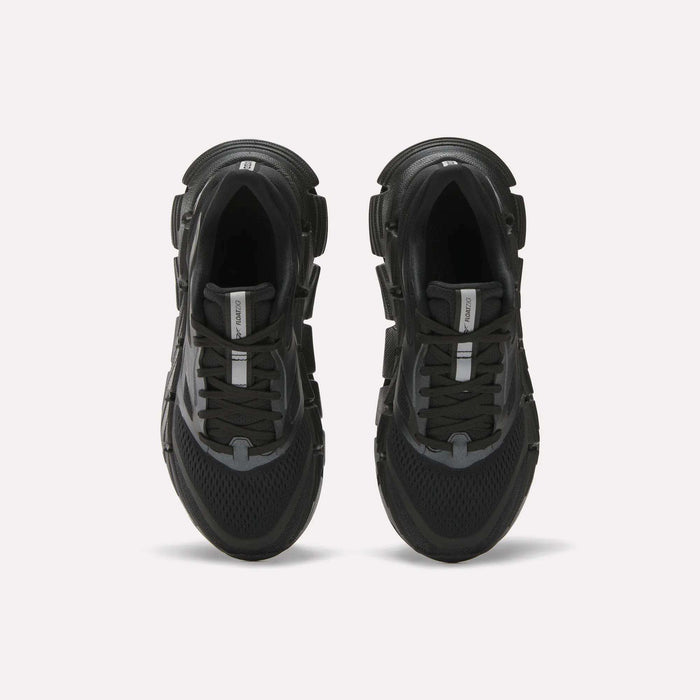 A pair of Reebok Women's FloatZig 2 black running shoes with thick soles, black laces, mesh detailing, and Superfloat+ cushioning, viewed from above on a plain white background.