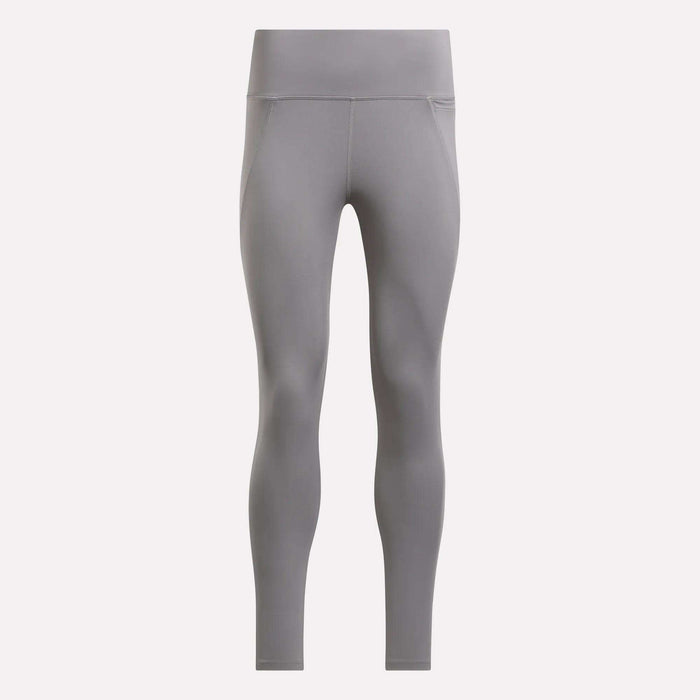 Women's Lux-Lite High-Rise Tights by Reebok in gray, shown front-facing against a plain light background. These full-length leggings feature seam details, RBK-DRY performance fabric, and a smooth high-waisted fit.