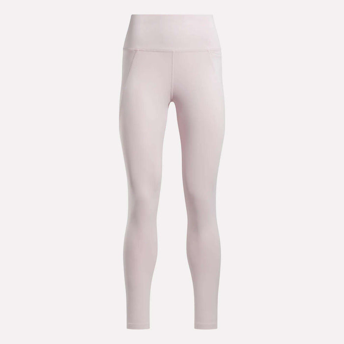 Light pink Reebok Women's High-Rise Leggings constructed from RBK-DRY performance fabric, featuring a smooth, seamless design and fitted, full-length silhouette with no visible branding. Shown against a plain white background.