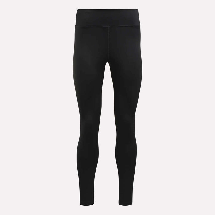 Black, full-length Women's Lux High-Rise Tights from Reebok, featuring RBK-DRY performance fabric and a seamless, smooth texture. These high-waisted training leggings are shown on a plain white background with no visible logos or patterns.