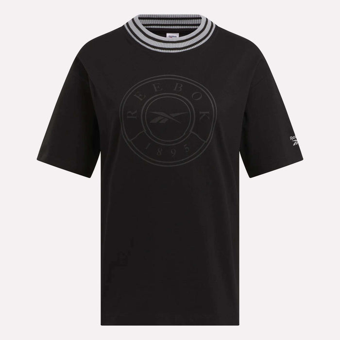 The Women's Lawn Club T-Shirt by Reebok features short sleeves, a black, white, and gray striped round collar, a circular Lawn Club 1895 logo on the front, and a small Reebok logo on the left sleeve—perfect for everyday wear.