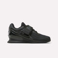 The Reebok Women's Legacy Lifter IV Training Shoes feature a thick sole, mesh upper, and wide midfoot strap, offering support and stability for weightlifting.