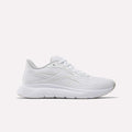 The Reebok Women's Nano Gym 2.0 Training Shoes in White/New Grey 1/White feature a textured sole, lace-up design, and subtle side logo, shown against a plain white background.