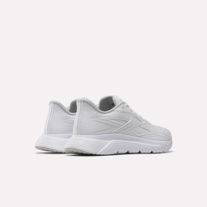 A pair of Reebok Women's Nano Gym 2.0 Training Shoes in white, featuring subtle textured patterns and a grey interior, displayed side by side on a light background from back and side views—ideal for your next workout.