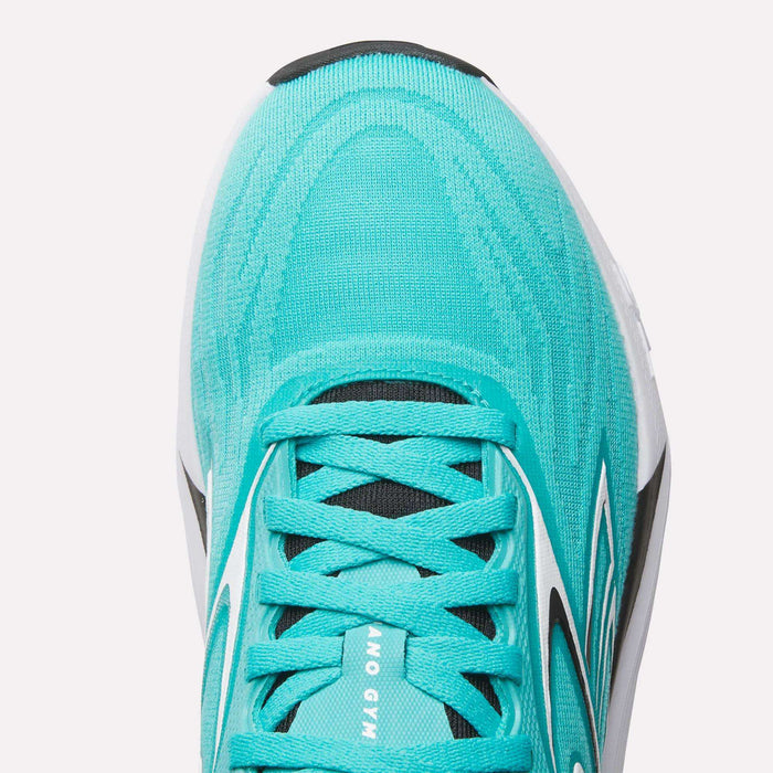 A close-up of the upper mesh and part of the sole on turquoise Reebok Women's Nano Gym 2.0 Training Shoes, featuring black laces and white accents.