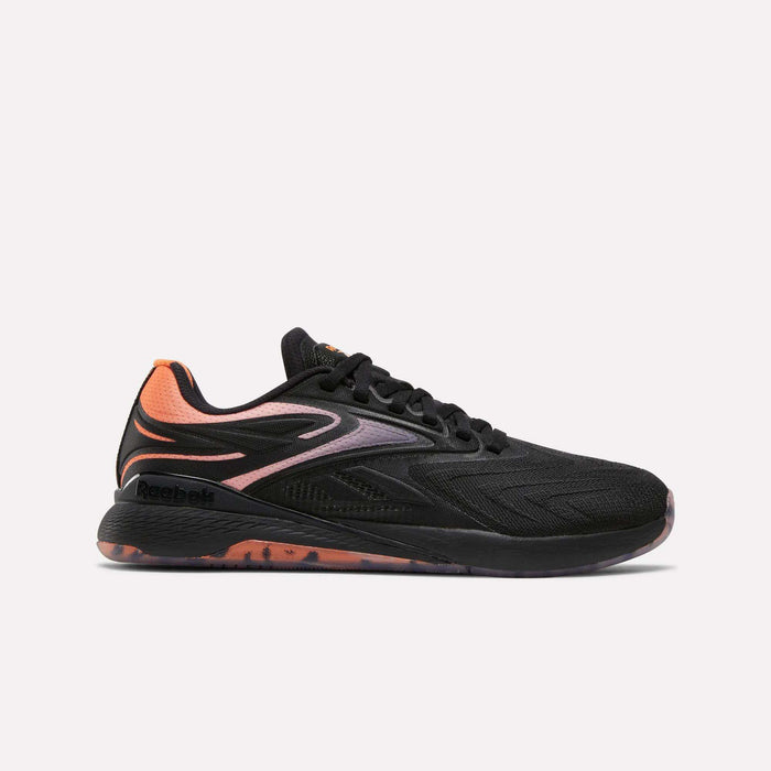 A side view of the Reebok Women's Nano X5 Edge Training Shoes in black with orange heel and sole accents, featuring a sleek lace-up design, set against a plain light background.