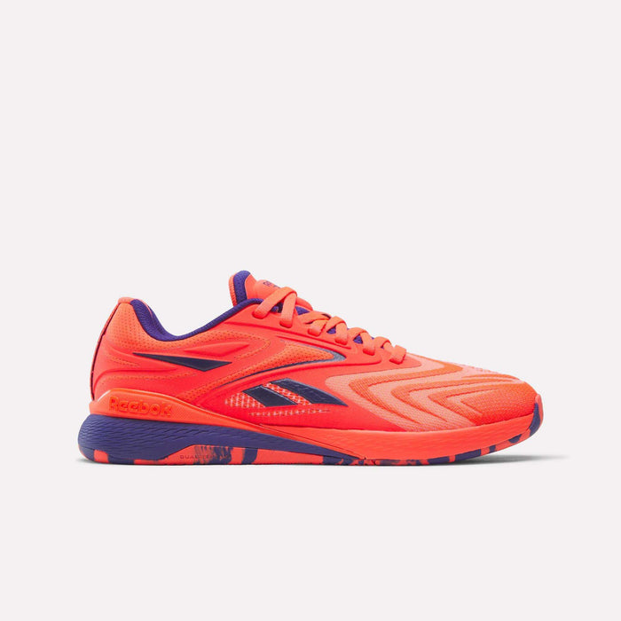 The Women's Nano X5 Edge Training Shoes by Reebok are bright orange with purple accents and sole, Reebok logo featured, ideal for HIIT classes, shown on a plain white background.