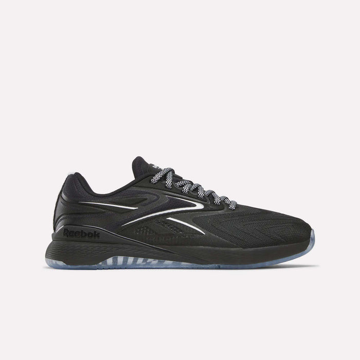 The Reebok Women's Nano X5 Edge Training Shoes feature a black mesh upper with white and silver accents, patterned black-and-white laces, and a translucent sole—perfect for HIIT or training—shown against a plain white background.