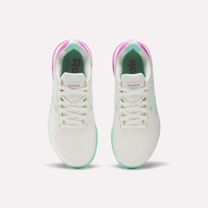 Top view of Women's Nano X5 Edge Training Shoes by Reebok, featuring pink and green accents, white laces, and branded tongues—ideal for HIIT—displayed side by side on a plain white background.