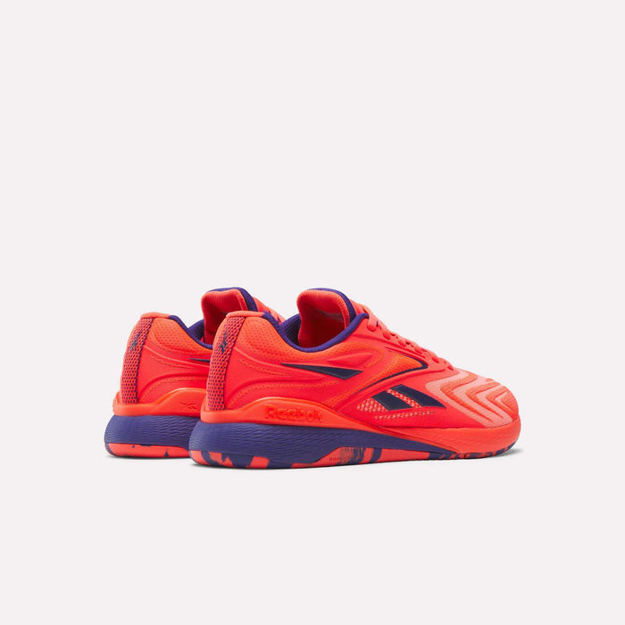 Women's Reebok Nano X5 Edge Training Shoes in bright red with dark blue accents and patterned soles, shown from back and side views on a white background—ideal for your next HIIT class.