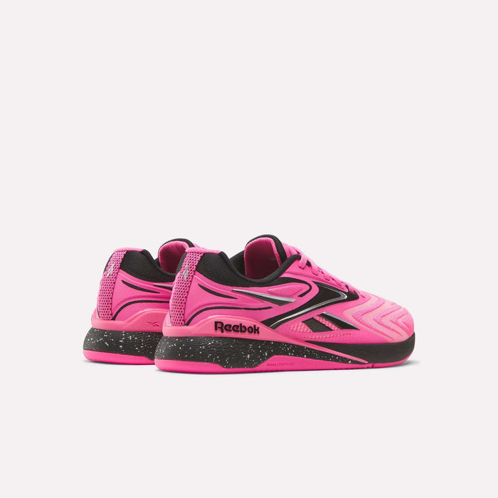 The Women's Reebok Nano X5 Edge Training Shoes feature a vibrant pink design with black accents and soles, plus the iconic Reebok logo on the side and heel. Shown on a white background—ideal for your next HIIT class.