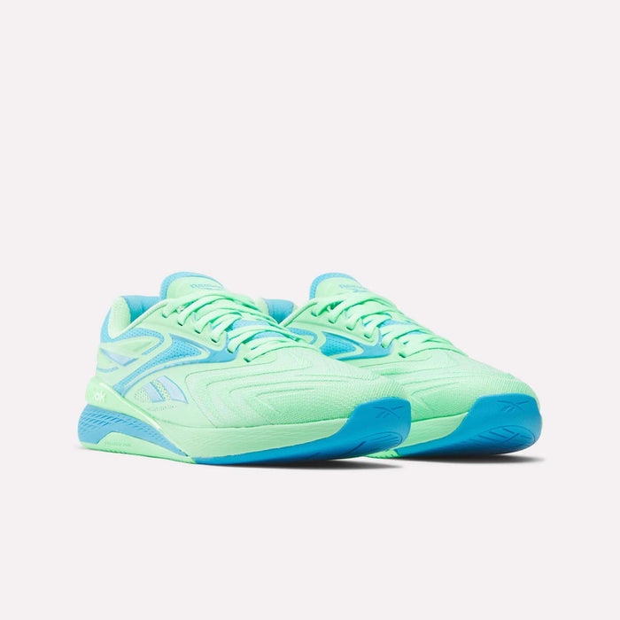 Reebok Women's Nano X5 Edge Training Shoes in light green with blue accents and blue soles, ideal for HIIT classes, shown on a plain white background.