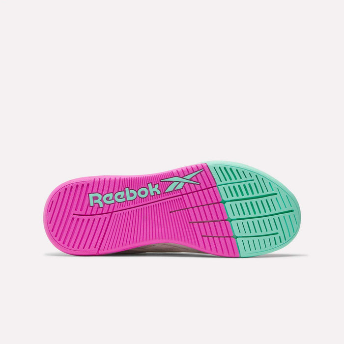 The Women's Reebok Nano X5 Edge Training Shoes feature a vibrant sole with pink and turquoise colors, distinct Reebok branding, and textured tread—perfect for powering through your next HIIT class.
