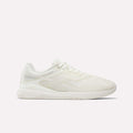 A side view of Reebok Nano X5 Women's Training Shoes in white, featuring a textured mesh design, lace-up closure, and slightly elevated sole, displayed against a plain white background.