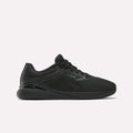 Reebok Women's Nano X5 Training Shoes are shown in black mesh with black laces and a flat rubber sole, viewed in side profile against a white background—a stylish pick for women’s trainers.