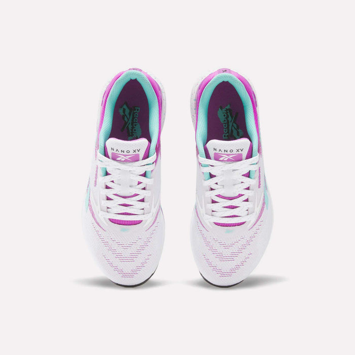 A pair of white Reebok Women's Nano X5 Training Shoes with teal and purple accents, shown from above on a plain white background. The Reebok logo is visible on the insoles and tongues of both shoes.