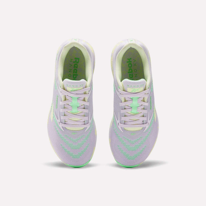 The Reebok Women's Nano X5 Training Shoes in lavender with mint green and light yellow accents are shown from above against a white background—iconic footwear that delivers both standout style and top-tier performance.