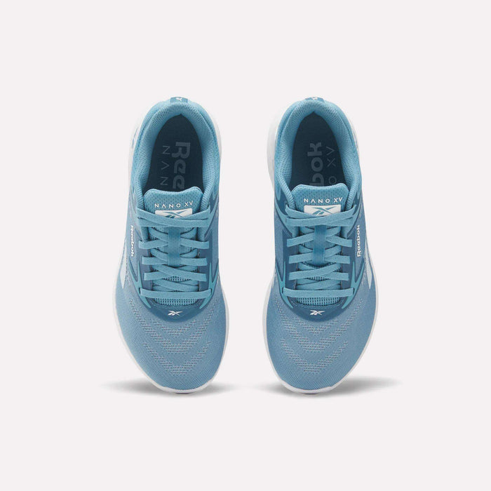 Top view of Reebok Nano X5 Women's Training Shoes in light blue with white soles and laces, displayed side by side on a white background, designed for superior comfort during every workout.