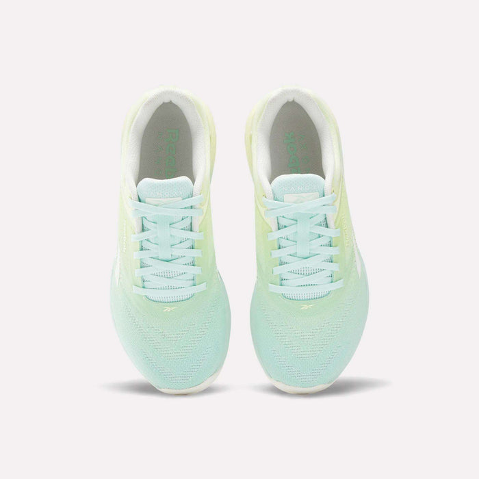 Top view of Reebok Women's Nano X5 Training Shoes in mint green with white soles and laces, placed side by side on a plain white background.
