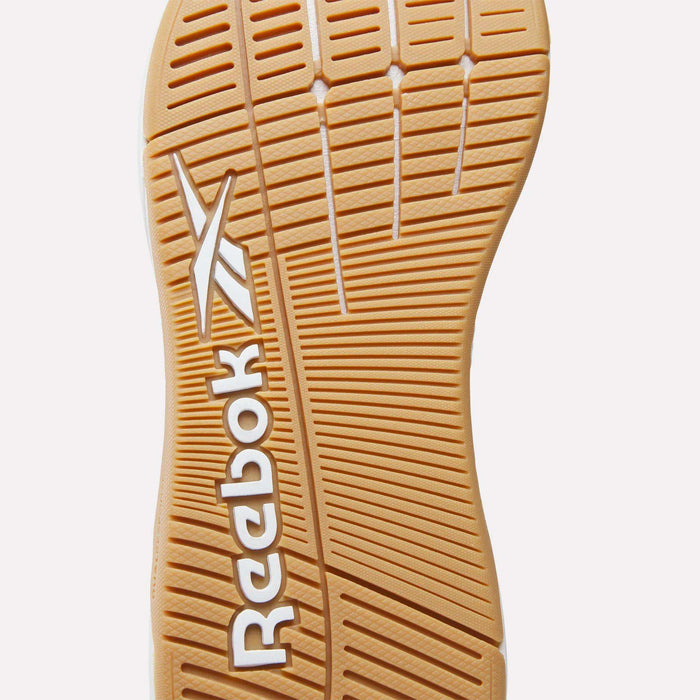 Close-up of the light brown rubber sole on Reebok Women's Nano X5 Training Shoes, featuring textured grooves for traction and the white Reebok logo—ideal for those wanting comfortable running or stylish women’s shoes.