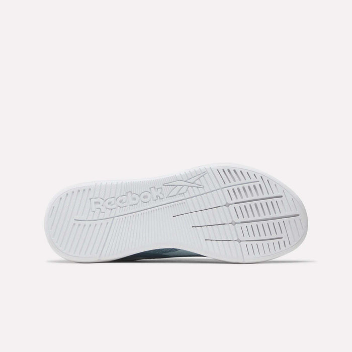 The image shows the white sole of Reebok Nano X5 Women's Training Shoes, displayed horizontally with visible tread pattern and Reebok logo, emphasizing optimal comfort against a plain, light background.